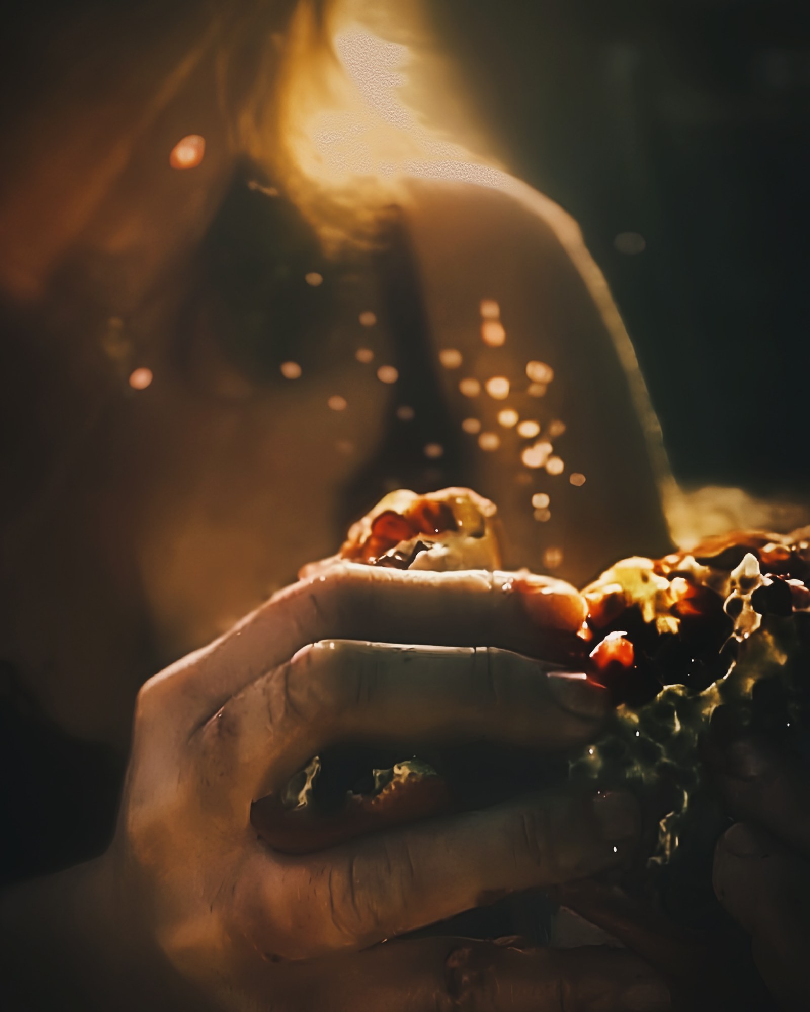 This Morning I Was Gathering Daffodils, further work. A hand in pomegranate seeds, sparks of light.