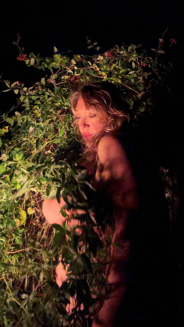 Fear Not, further work. Eyes lowered, side-lit, the body wrapped in glowing vines.